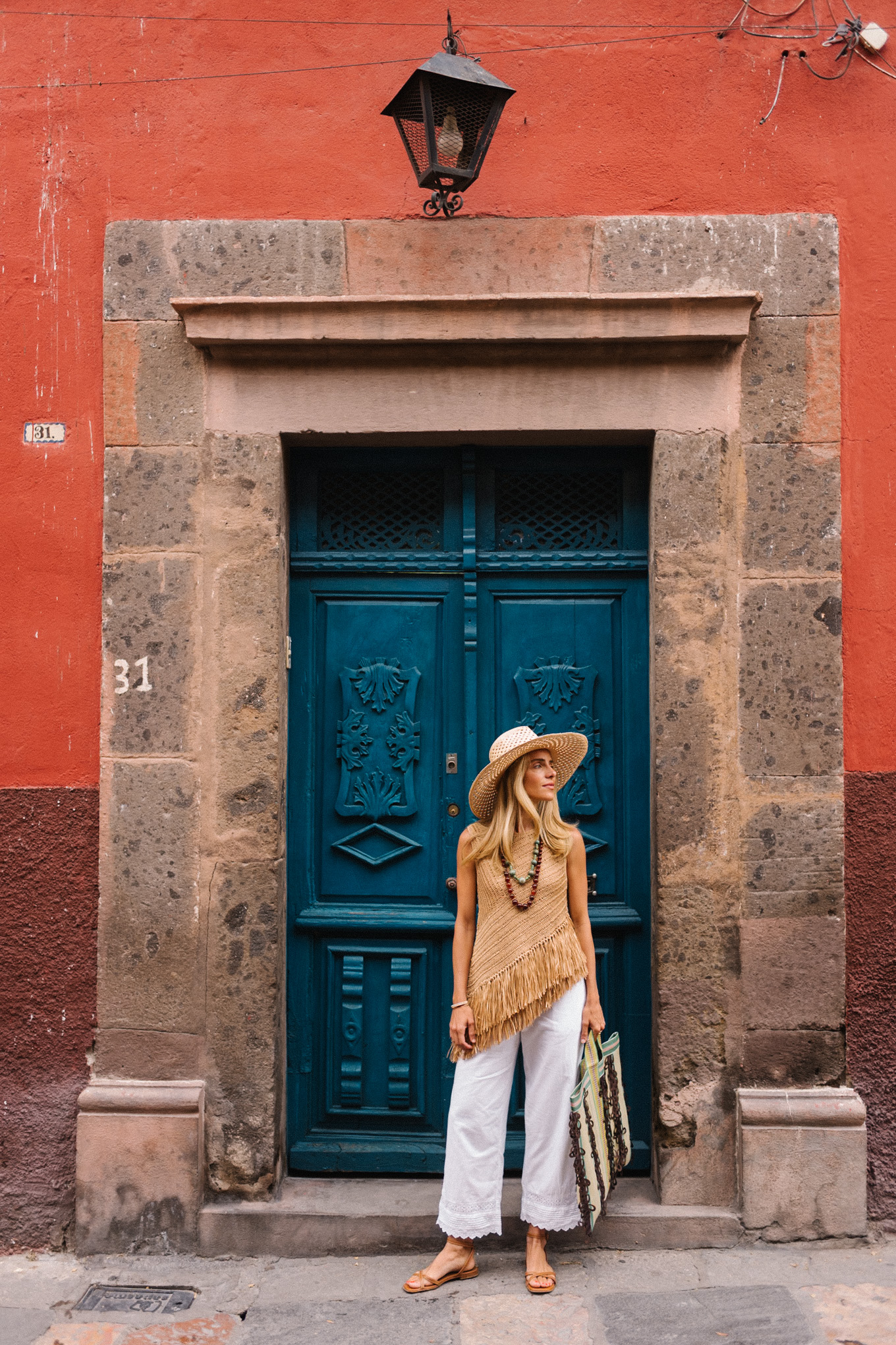 Pantalon de lein blanc à la frange tissu blanc