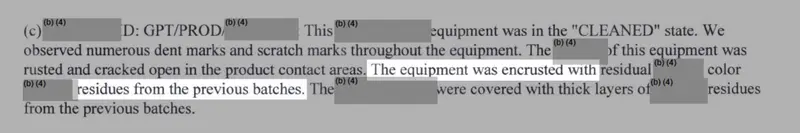 A grayscale image of an FDA report with the phrases “The equipment was encrusted with” and “residues from the previous batches” highlighted in white.