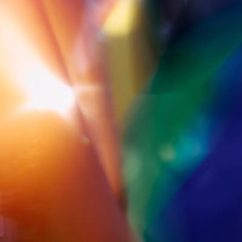 A blurry rainbow flag with light peeking through.