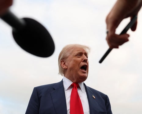 Donald Trump speaks to the media on his arrival in Scotland.