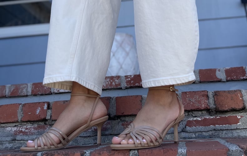 Beige heeled sandals with white pants