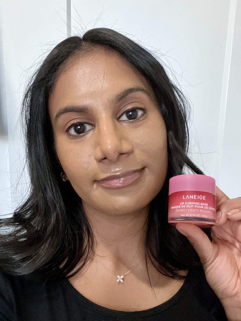Woman wearing the Laneige Lip Sleeping Mask in Berry.