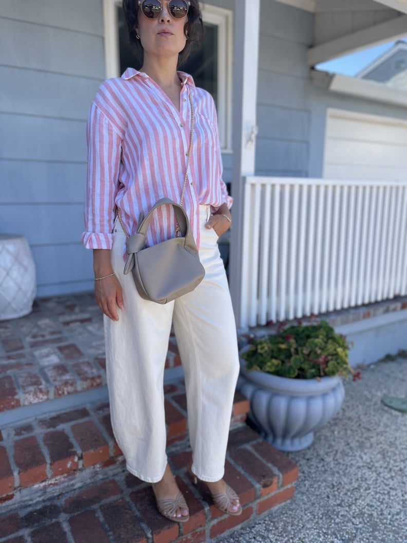 Beige heeled sandals with white pants and striped button up