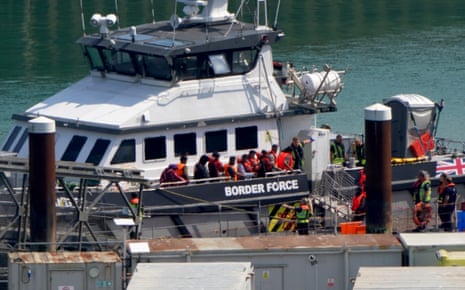 Migrants being brought in to the Border Force compound in Dover from a Border Force vessel following a small boat incident in the Channel yesterday.
