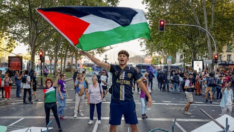 Final stage of Vuelta a España abandoned after pro-Palestine protesters swamp finish line – video