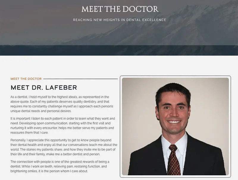 A smiling man with black hair wearing a black suit and maroon checked tie. The banner at the top of the page reads: “Meet the doctor: Reaching new heights in dental excellence.”