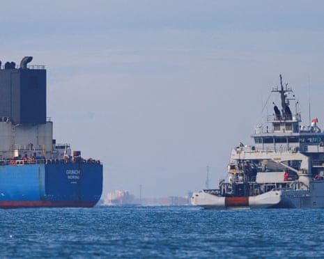 A French navy boat surrounds the Grinch oil tanker, intercepted by France in the Alboran Sea on suspicion of operating under a false flag and belonging to Russia’s shadow fleet that enables Russia to export oil despite sanctions.