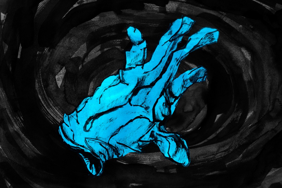 A black abyss surrounds a wrinkled, discarded medical glove.