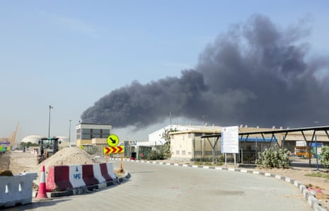 Smoke billows from Jebel Ali port after an Iranian attack.
