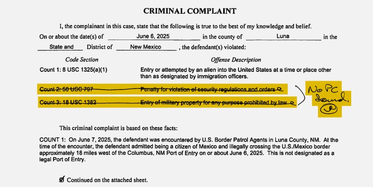 A criminal complaint issued in New Mexico with two lines of the complaint highlighted and struck out with a pen, near a note in pen that reads “No PC found” and an initial. The struck out portions read “Count 2: 50 USC 797 Penalty for violation of security regulations and orders” and “Count 3: 18 USC 1382 Entry of military property for any purpose prohibited by law.”