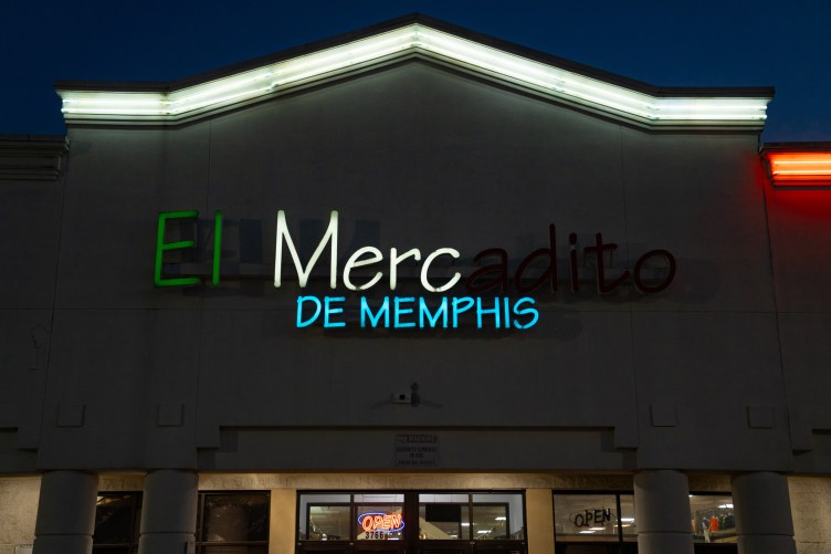 The exterior of a building, with a sign that reads, “El Mercadito de Memphis.”