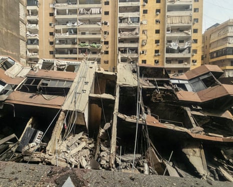 A collapsed building at the site of an overnight Israeli airstrike in the Haret Hreik neighbourhood of Beirut’s southern suburbs on Friday