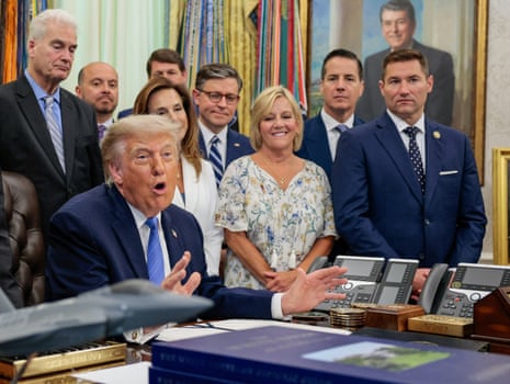 Mike Johnson listens as Donald Trump speaks to reporters in the Oval Office on 10 June 2026.