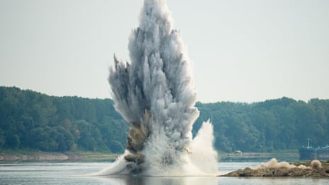 Romanian navy blows up rock in Danube to redirect water to nuclear plant – video