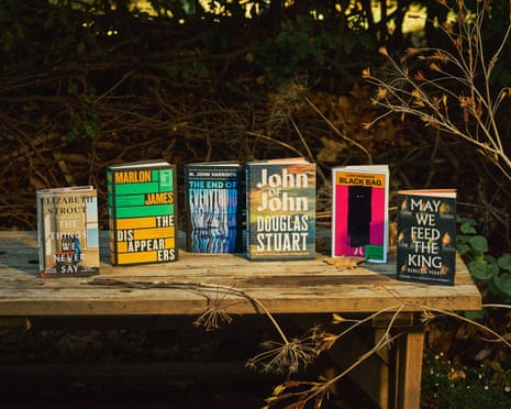 The Booker 2026 shortlist. Six books set out on a table.