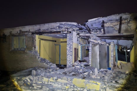 A heavily damaged building as seen from outside.