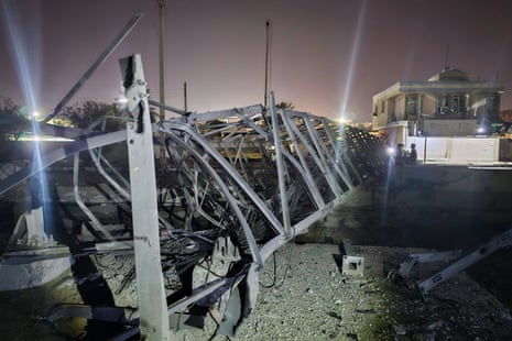 A communication tower toppled to the ground. 