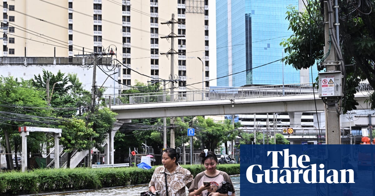 ‘Our house was under water’: Bangkok floods force thousands into shelters as disaster declared | Thailand