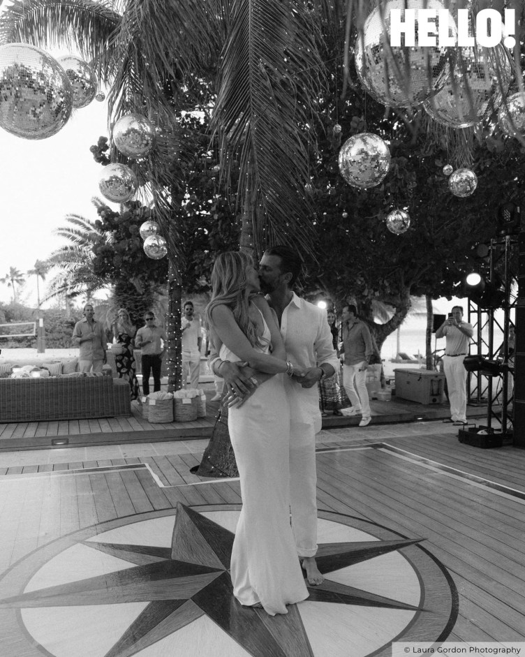A photo of Donald Trump Jr. and his wife, Bettina, kissing on a dance floor.