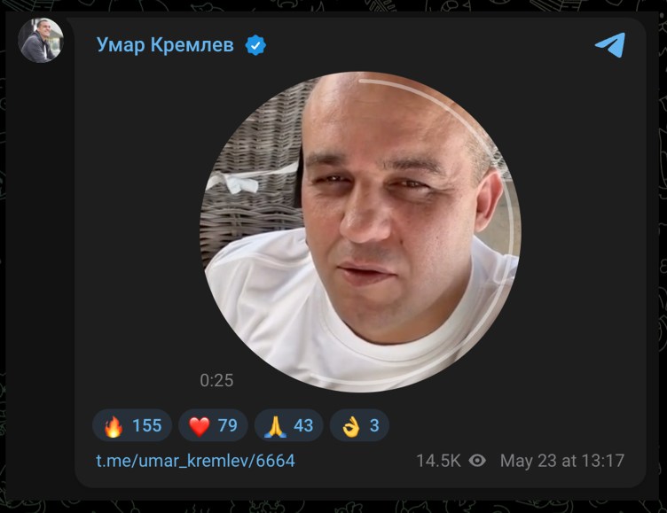 A screenshot of a Telegram post by Umar Kremlev shows him talking into a camera in front of a wicker chair with a white bow.