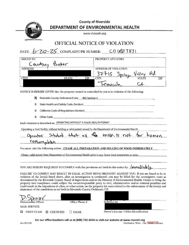 A scanned official document featuring a handwritten note stating that the milk at the food facility is not for human consumption.