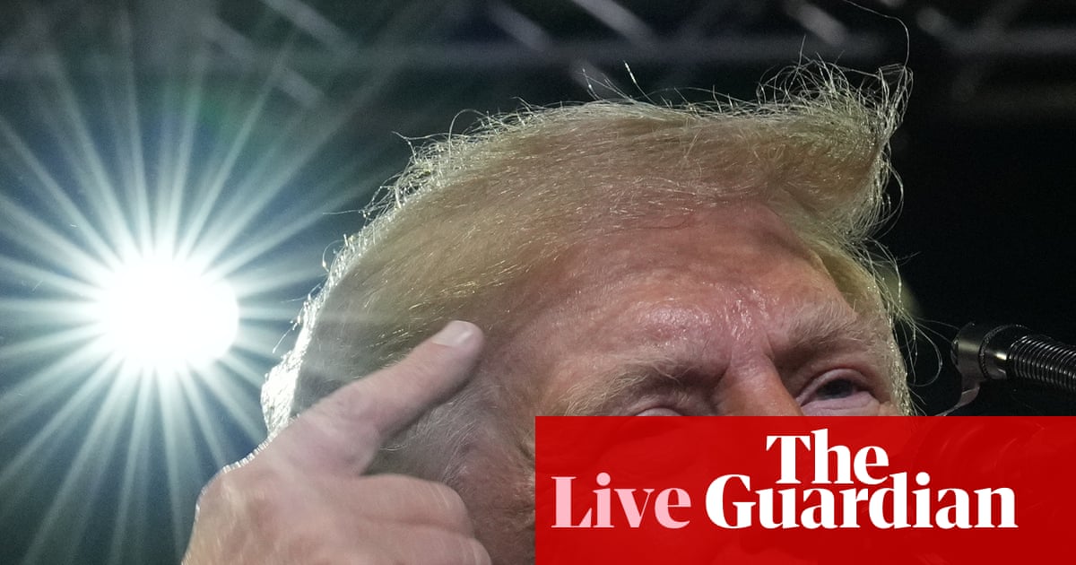 Trump targets Ilhan Omar at rally following raid on her home – US politics live | Donald Trump