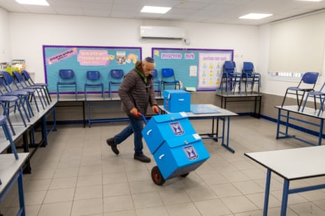 Ballot boxes are set up at a school in Tel Aviv.