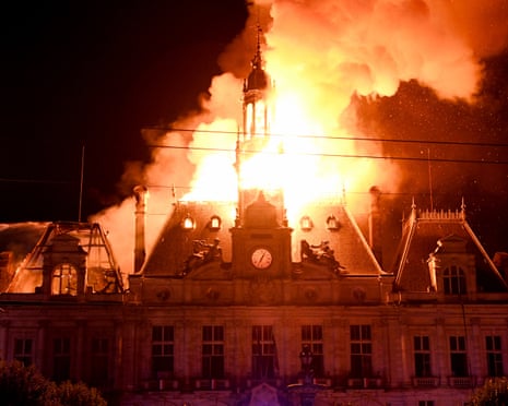 The Hôtel de Ville in Limoges, central France, on fire during a weekend of unrest