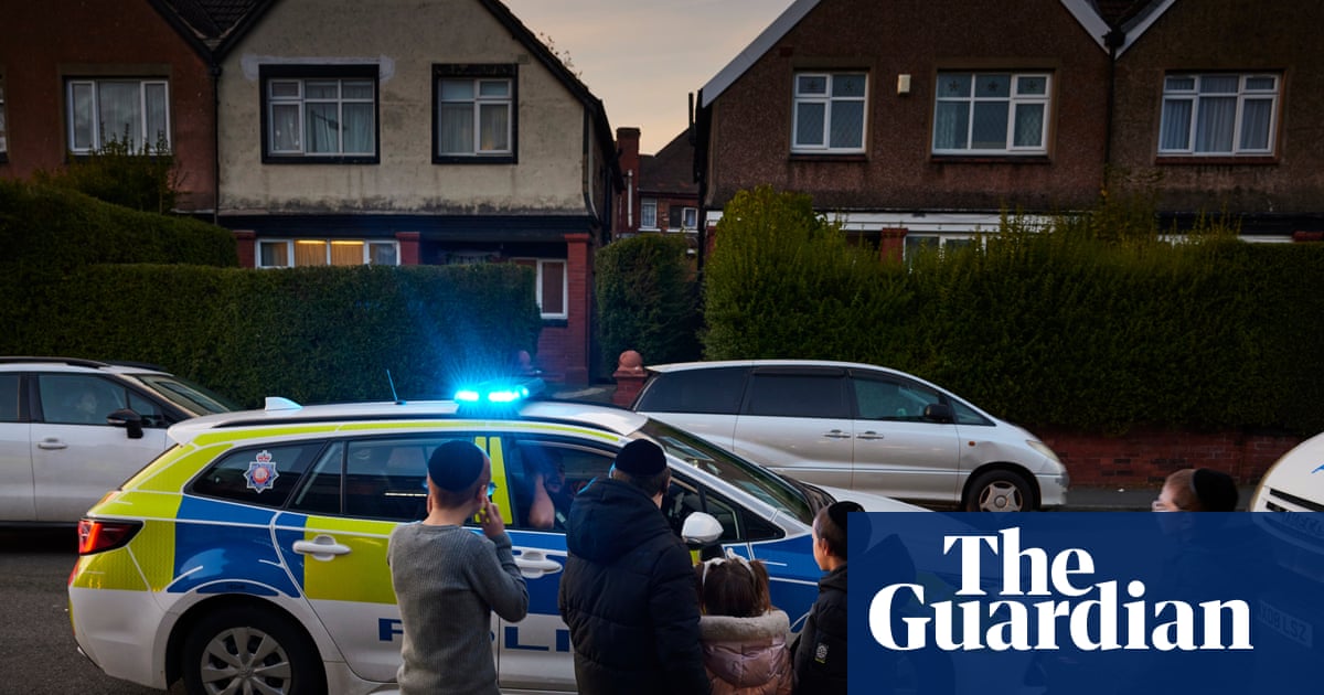 Two Iranian men charged over alleged terror plot targeting Manchester’s Jewish community | UK news